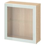 BESTÅ Mobile con anta a vetro - effetto rovere mordente bianco Glassvik/bianco/verde chiaro vetro trasparente 60x22x64 cm